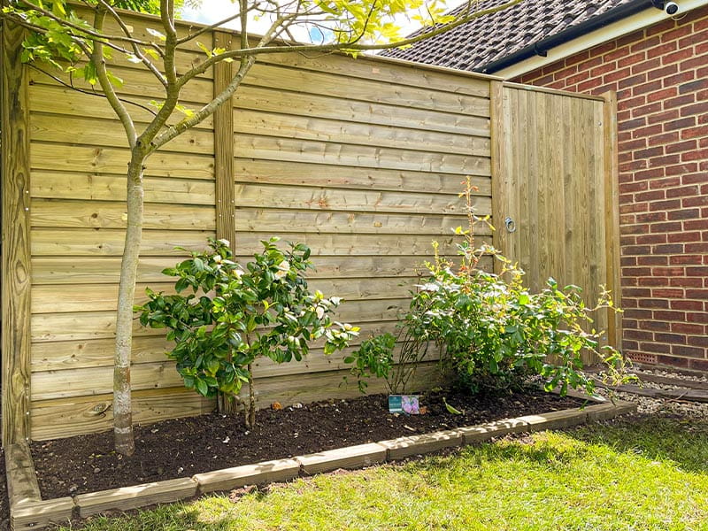 Pressure treated shadow box fence best sale